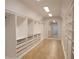 Spacious walk-in closet with custom shelving and ample storage space at 1895 Henley Way, Alpharetta, GA 30009