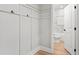 Stylish bathroom entryway features a tub with marble tiling at 2128 Hosea L Williams Ne Dr, Atlanta, GA 30317