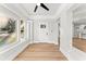 Inviting foyer with hardwood floors, and a modern ceiling fan for efficient climate control at 2128 Hosea L Williams Ne Dr, Atlanta, GA 30317