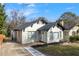 Charming home featuring a brick facade, black trim, and a landscaped yard with a new walkway at 2128 Hosea L Williams Ne Dr, Atlanta, GA 30317