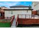 Back of a house with a multi-level deck, stairs, and yard space at 2128 Hosea L Williams Ne Dr, Atlanta, GA 30317