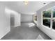 Spacious bedroom with a view through a large window allowing for plenty of natural light at 3217 Fairington Dr, Lithonia, GA 30038