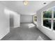 Spacious bedroom with a view through a large window allowing for plenty of natural light at 3217 Fairington Dr, Lithonia, GA 30038