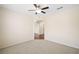 Versatile bonus room with neutral carpet, overhead lighting and passage to another room at 522 Spring View Dr, Woodstock, GA 30188