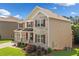 Beautiful two-story home featuring brick accents, a well-manicured lawn, and an attached two-car garage at 522 Spring View Dr, Woodstock, GA 30188