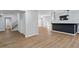 The finished basement offers a bar, LVP flooring, recessed lighting, and access to the backyard at 2023 Stoneleigh Dr, Stone Mountain, GA 30087