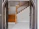Grand foyer view featuring elegant double doors, marble floors, and a staircase at 2023 Stoneleigh Dr, Stone Mountain, GA 30087