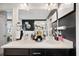 Bathroom with a dual sink vanity, and modern decor, including a chandelier and a mirror at 2404 Fitts Dr, Conyers, GA 30094