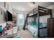 bedroom features a bunk bed, desk and a cozy atmosphere at 2404 Fitts Dr, Conyers, GA 30094