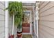 Inviting front entry decorated with seasonal decor and hanging fern at 2404 Fitts Dr, Conyers, GA 30094