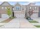 Charming townhome featuring brick facade, inviting curb appeal, and attached one-car garage at 2404 Fitts Dr, Conyers, GA 30094