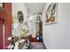 Stylish hallway with wood floors, decorative shelving, and modern artwork at 2404 Fitts Dr, Conyers, GA 30094