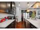 Spacious kitchen with quartz countertops, stainless steel appliances, and modern cabinetry at 2404 Fitts Dr, Conyers, GA 30094