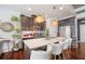 Well-appointed kitchen with modern cabinets, an island, and stainless steel appliances at 2404 Fitts Dr, Conyers, GA 30094