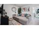 Comfortable living room featuring a sectional sofa, area rug and natural light at 2404 Fitts Dr, Conyers, GA 30094