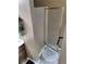 This bathroom shower has glass doors and tan walls and tile at 3587 Plum Creek Nw Trl, Kennesaw, GA 30152