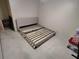 Bedroom featuring a bed frame on neutral carpet at 3587 Plum Creek Nw Trl, Kennesaw, GA 30152