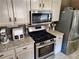 Beautiful kitchen featuring a stainless steel oven and a microwave above the oven at 3587 Plum Creek Nw Trl, Kennesaw, GA 30152