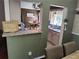 Breakfast bar overlooking the kitchen and dining room, great for entertaining at 3587 Plum Creek Nw Trl, Kennesaw, GA 30152