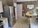 Eat in kitchen featuring stainless steel refrigerator and pantry at 3587 Plum Creek Nw Trl, Kennesaw, GA 30152