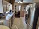Modern kitchen with stainless steel appliances, stylish countertops, and convenient layout at 3587 Plum Creek Nw Trl, Kennesaw, GA 30152