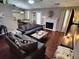 Spacious living room featuring a cozy fireplace and comfortable seating arrangement at 3587 Plum Creek Nw Trl, Kennesaw, GA 30152
