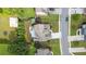 Overhead view of a home with a well-kept yard, patio area, and mature landscaping in a quiet neighborhood at 452 Rockford Pass, Marietta, GA 30064