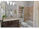 Traditional bathroom with tile surround and granite countertop at 452 Rockford Pass, Marietta, GA 30064