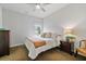 Cozy bedroom featuring neutral tones and soft, natural light from the window at 452 Rockford Pass, Marietta, GA 30064
