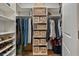 Walk-in closet with custom shelving and organization systems provides ample storage at 452 Rockford Pass, Marietta, GA 30064