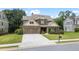 Inviting two-story home featuring a well-kept lawn and a convenient two-car garage at 452 Rockford Pass, Marietta, GA 30064