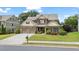 Traditional home boasting a brick facade, two car garage, and manicured lawn at 452 Rockford Pass, Marietta, GA 30064