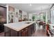 Open kitchen layout showcasing a large island, stainless steel appliances, and granite countertops at 452 Rockford Pass, Marietta, GA 30064