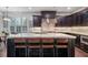 Kitchen featuring dark cabinets, stainless steel appliances, and an island with bar seating at 452 Rockford Pass, Marietta, GA 30064