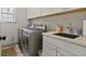 Convenient laundry room features modern appliances and ample storage at 452 Rockford Pass, Marietta, GA 30064