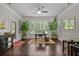 Bright living space with hardwood floors, plantation shutters, and stylish decor creates a welcoming atmosphere at 452 Rockford Pass, Marietta, GA 30064