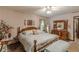 Comfortable bedroom with a bed, bedside tables, lamps, and soft, inviting decor at 1667 Quail Run, Conyers, GA 30094