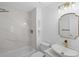Remodeled bathroom featuring a shower/tub combo and a gold faucet at 1711 Summit Glen Ln, Atlanta, GA 30329