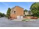 This beautiful house has an attached two-car garage and a well-maintained lawn at 1711 Summit Glen Ln, Atlanta, GA 30329