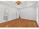 Spacious primary bedroom with ensuite bathroom, walk-in closet, and hardwood floors at 1711 Summit Glen Ln, Atlanta, GA 30329