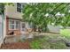 Private patio area nestled in a backyard oasis, perfect for outdoor relaxation and entertainment at 2515 Gadsen Walk, Duluth, GA 30097