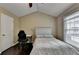 Cozy bedroom featuring a ceiling fan and a large window with blinds at 2515 Gadsen Walk, Duluth, GA 30097