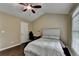 Cozy bedroom featuring a ceiling fan and lots of natural light at 2515 Gadsen Walk, Duluth, GA 30097