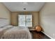 Bedroom featuring hardwood floors and lots of natural light at 2515 Gadsen Walk, Duluth, GA 30097