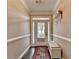 Inviting entryway with hardwood floors, a decorative rug, and ample natural light at 2515 Gadsen Walk, Duluth, GA 30097