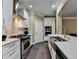 Stylish kitchen with stainless steel appliances, a gas range, and white cabinetry at 2515 Gadsen Walk, Duluth, GA 30097