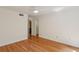 Bedroom features hardwood floors and a large closet space at 4254 River Green Dr # 613, Atlanta, GA 30327