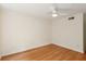 Bedroom features hardwood floors, a ceiling fan and neutral walls at 4254 River Green Dr # 613, Atlanta, GA 30327