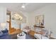 Cozy living room with hardwood floors and an open view to the modern kitchen at 4254 River Green Dr # 613, Atlanta, GA 30327
