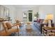 Bright living room with hardwood floors, balcony access and stylish decor at 4254 River Green Dr # 613, Atlanta, GA 30327